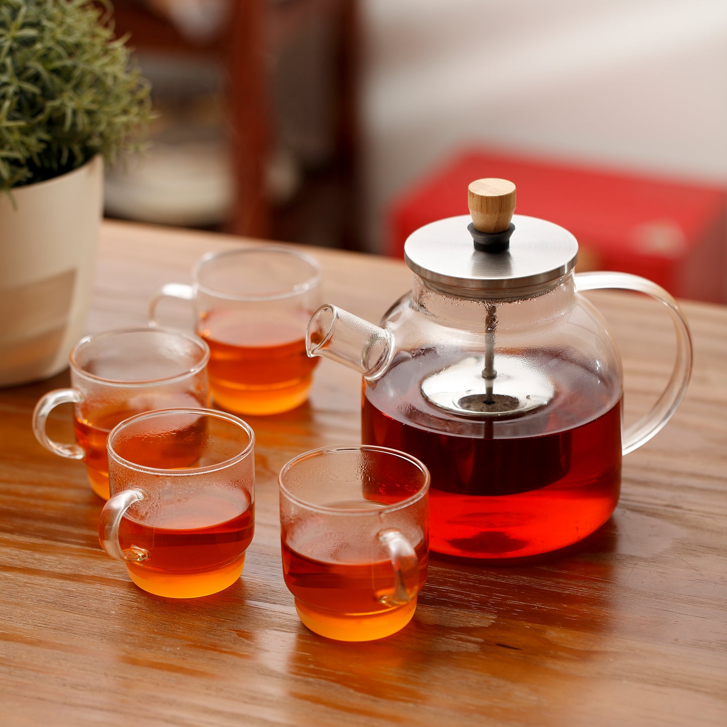 Heat resistant borosilicate glass 1L teapot with centered ss filter + foldable lift-up handle