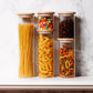 Glass storage jars set. Stackable glass jar with natural wood