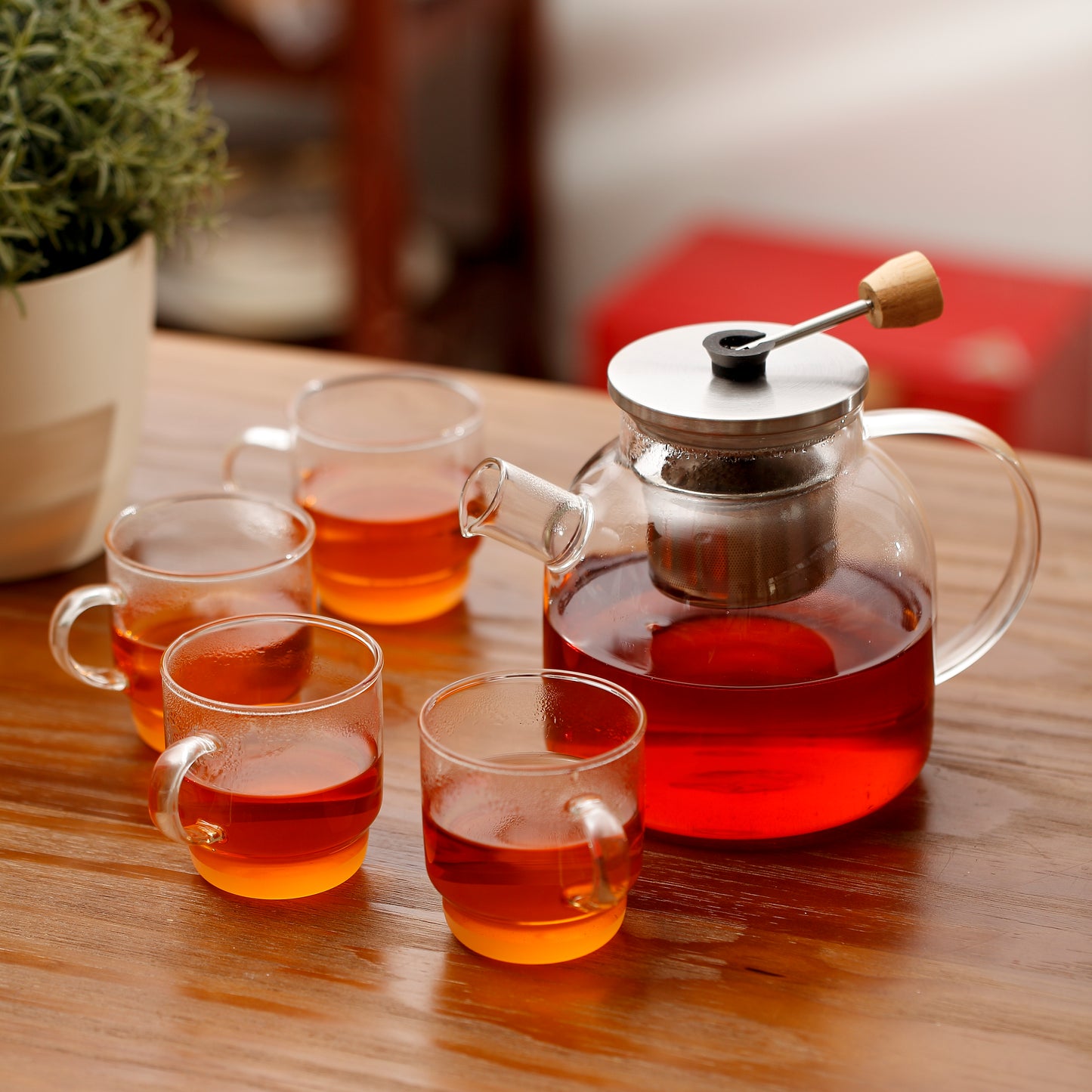 Heat resistant borosilicate glass 1L teapot with centered ss filter + foldable lift-up handle