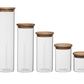 Glass storage jars set. Stackable glass jar with natural wood